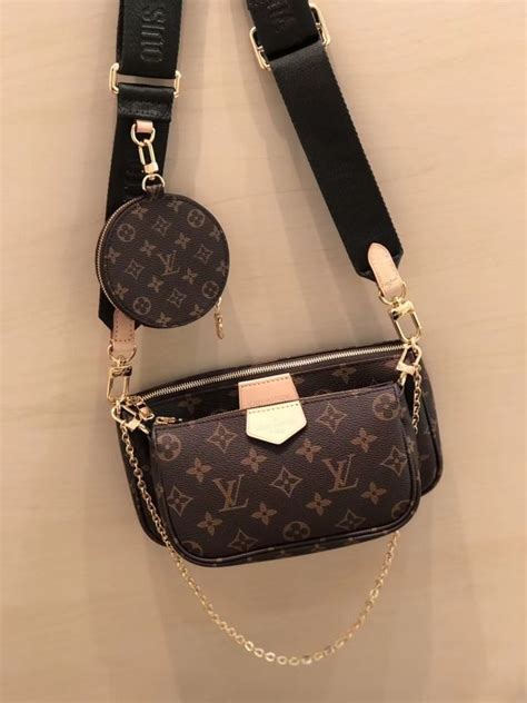 lv crossbody with coin purse.